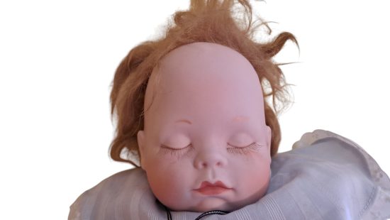 Porzellan-Puppe