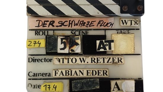 Filmklappe mit Brandspuren