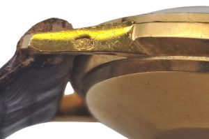 Goldene Herrenarmbanduhr