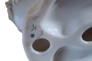 Asiatische Porzellanfigur WZ